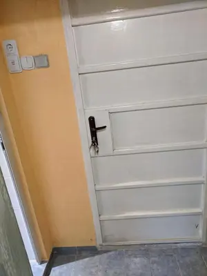 a door in a room with a doorhaarhaar at Midtown Place Apartment Loft таванска стая с баня DORIS 2 in Plovdiv