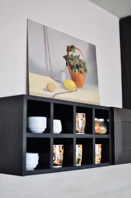 a cabinet with a picture of a plant in it at **Mountain** views just next to the gondola lift in Bansko