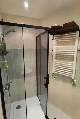 a shower with a glass door in a bathroom at Studio 1 Iceberg Borovets in Borovets