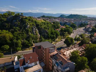 an aerial view of a city with buildings and trees at Retro Studio byPMM in Plovdiv