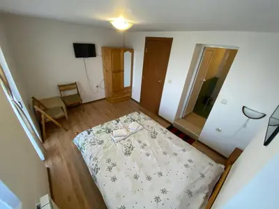 a small room with a bed in a room at Villa Pontica in Sofia