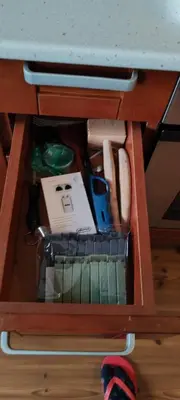 a drawer under a desk with a table at iVAVev CedarLodge Bansko in Bansko