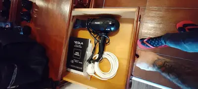 a light in a drawer with a camera in it at iVAVev CedarLodge Bansko in Bansko