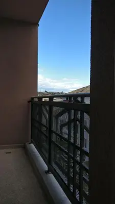 a balcony with a view of the sky at Къща за гости Роял in Sandanski