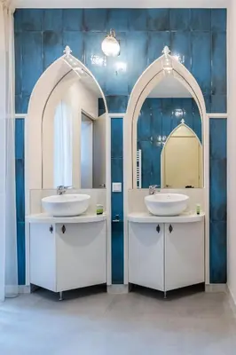 a bathroom with two sinks and two mirrors at Semiramis` Suite 2-bedroom Lux Apartment in Sofia