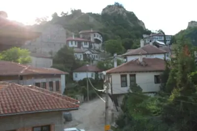 a group of houses on a hill with a street at BULGARI melnik in Melnik