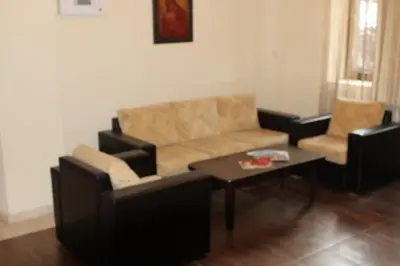 a living room with a couch and a coffee table at BULGARI melnik in Melnik