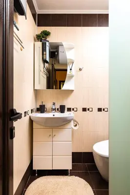 a bathroom with a sink and a mirror at Cozy new Apartment 'Casa Vacanza ' ✵ TOP CENTER ✵ in Plovdiv