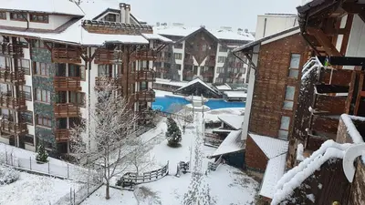 an aerial view of a resort in the snow at Belvedere Holiday Club VIP Apartment H 82 in Bansko