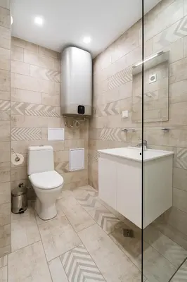 a bathroom with a toilet and a sink at South Panoramic Apartment in the art district of Kapana in Plovdiv