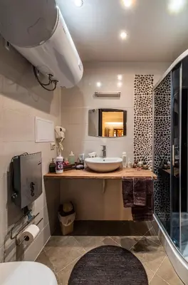 a bathroom with a sink and a mirror at Ковачева-3 in Bansko
