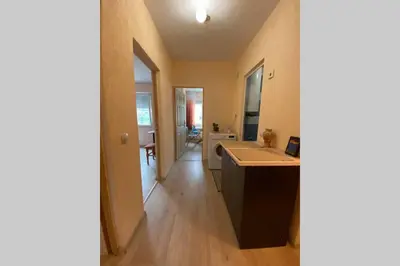 a kitchen with a sink and a counter top at Sunny apartment by the river in Sandanski