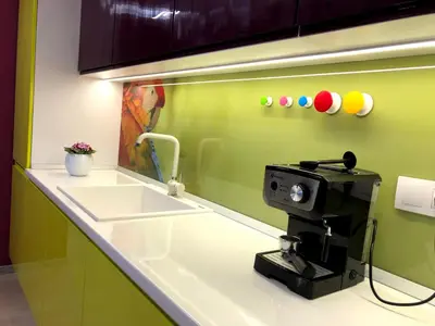 a kitchen counter with a sink and a coffee machine at Ultraviolet relax apart in Sofia