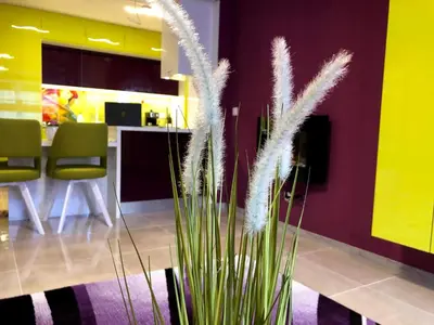 a lobby with a table and some tall grass at Ultraviolet relax apart in Sofia