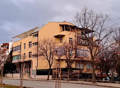 a large building on the side of a street at Студио Цвят/ Studio Colour in Blagoevgrad