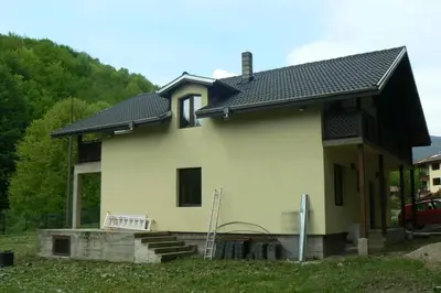 a house with a black roof on top of it at Nordic Villa Chiflika in Chiflik