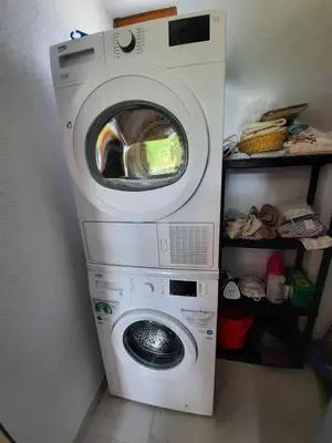 a washing machine and a washer in a room at Mountain Villa near Bansko in Razlog