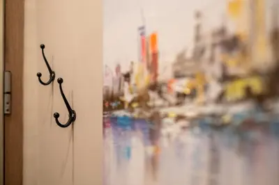 a close up of a door with a painting on the wall at Bohemia - New Apartment with Stylish Design in Sofia