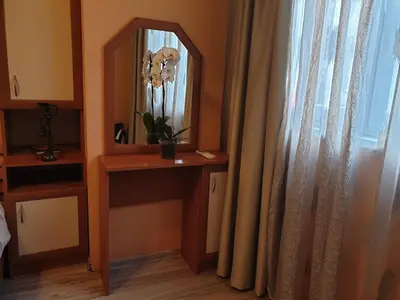 a room with a mirror and a table and a window at Jasmine appart Metro station, 2BDR, FREE Parking in Sofia