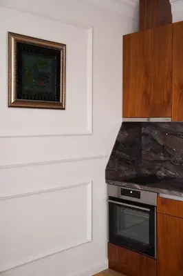 a kitchen with a counter top and a stove at FELIX KANITZ Apartments - in the heart of Kapana district in Plovdiv