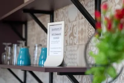 a shelf with a sign on top of it at Funky apartment in Studentski Grad in Sofia