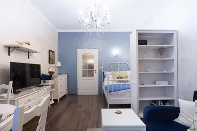 a small room with a bedroom with a crib at TOP CENTER Designer studio 1 minute to NDK&Vitosha by Flat Mаnager in Sofia