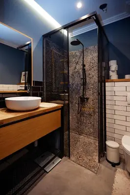a bathroom with a shower with a sink and a toilet at COURTHOUSE #4 EXCLUSIVE Top Center PRIVATE GARDEN in Sofia
