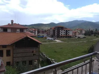 a view from a balcony of a town with buildings at Nev Apart New in Velingrad
