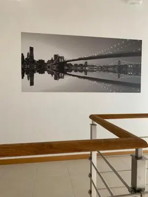 a picture of a light hanging on a wall at Луксозна вила - Стрелча, джакузи с минерална вода in Strelcha