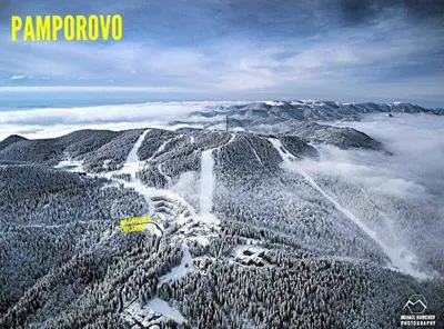 an aerial view of a snow covered mountain at Christina Apartment in Laplandia in Pamporovo