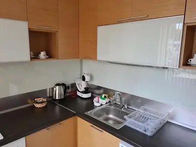 a kitchen with a sink and a counter top at Студиа Студенец in Smolyan