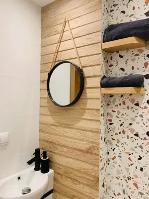 a bathroom with a mirror and a sink at LUXURIOUS ONE BEDROOM STUDIO IN TOP CENTER in Blagoevgrad