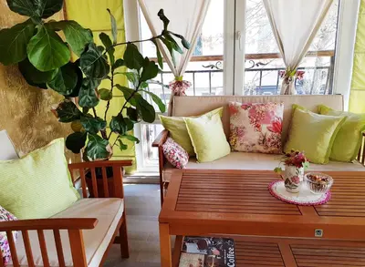 a living room with a couch and a table at Apartment Nicole in Plovdiv