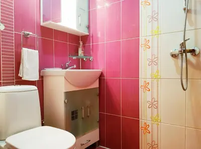 a bathroom with a toilet and a sink at Apartment Nicole in Plovdiv