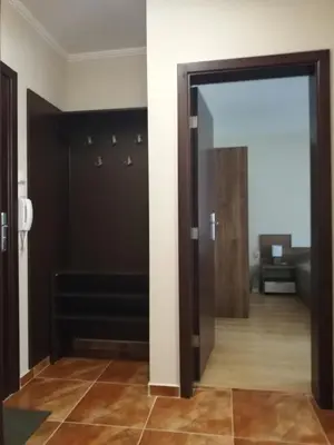 an open door in a room with a hallway at Dobi's Apartment Elit47 at Elit Pamporovo in Pamporovo