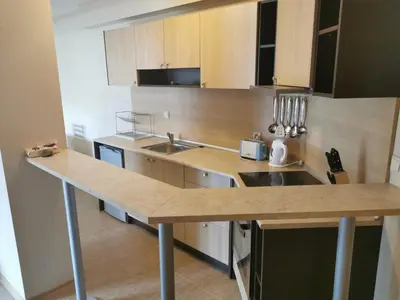 a kitchen with a sink and a counter top at Na planina in Razlog