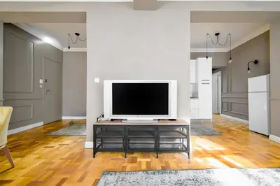a living room with a television on a table at 2bdr Luxury On Prime Location in Sofia
