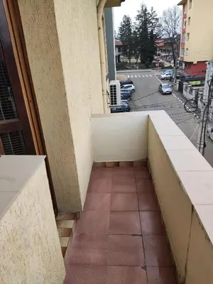 a balcony of a building with a view of a street at Rila Apartment in Samokov