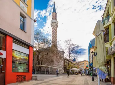 a street with a tower in the middle of a city at 1BD Apartment with a Cute Balcony in Kapana by Flat Mаnager in Plovdiv