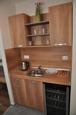 a small kitchen with a sink and a microwave at Hashtag Studio Borovets in Borovets