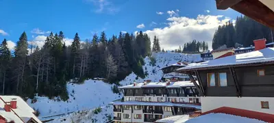a view of a ski resort in the snow at Apartments KaVi , Monastery 1 & 3, Grand Monastery,Pamporovo in Pamporovo