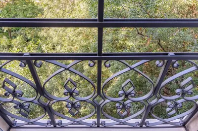 a view from a balcony with a iron fence at R & R Apartments in Sofia