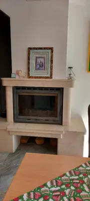 a flat screen tv sitting in a living room at BOGI SPA Apartment Pamporovo in Pamporovo