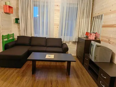 a living room with a couch and a coffee table at Bansko Royal Towers - Studio 815 in Bansko