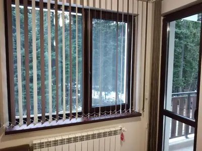 a bathroom with two windows with vertical blinds at Borovets Gardens apartment A20 in Borovets