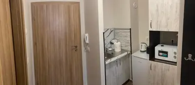 a small kitchen with a sink and a counter at Borovets Gardens apartment A20 in Borovets