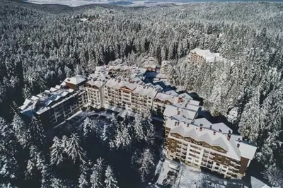 an aerial view of a resort in the snow at Borovets Gardens apartment A20 in Borovets