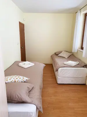 a room with two beds in a room at Ski Area 202 apt, The Castle 1, Pamporovo in Pamporovo