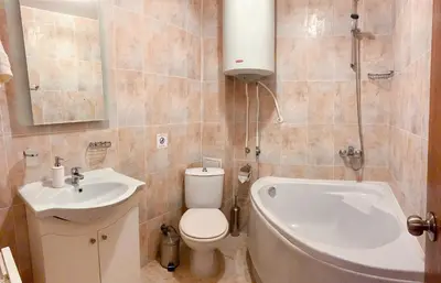 a bathroom with a sink and a toilet and a sink at Ski Area 202 apt, The Castle 1, Pamporovo in Pamporovo