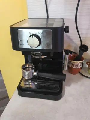a coffee maker sitting on top of a counter at Koko's apartments 2 in Bansko